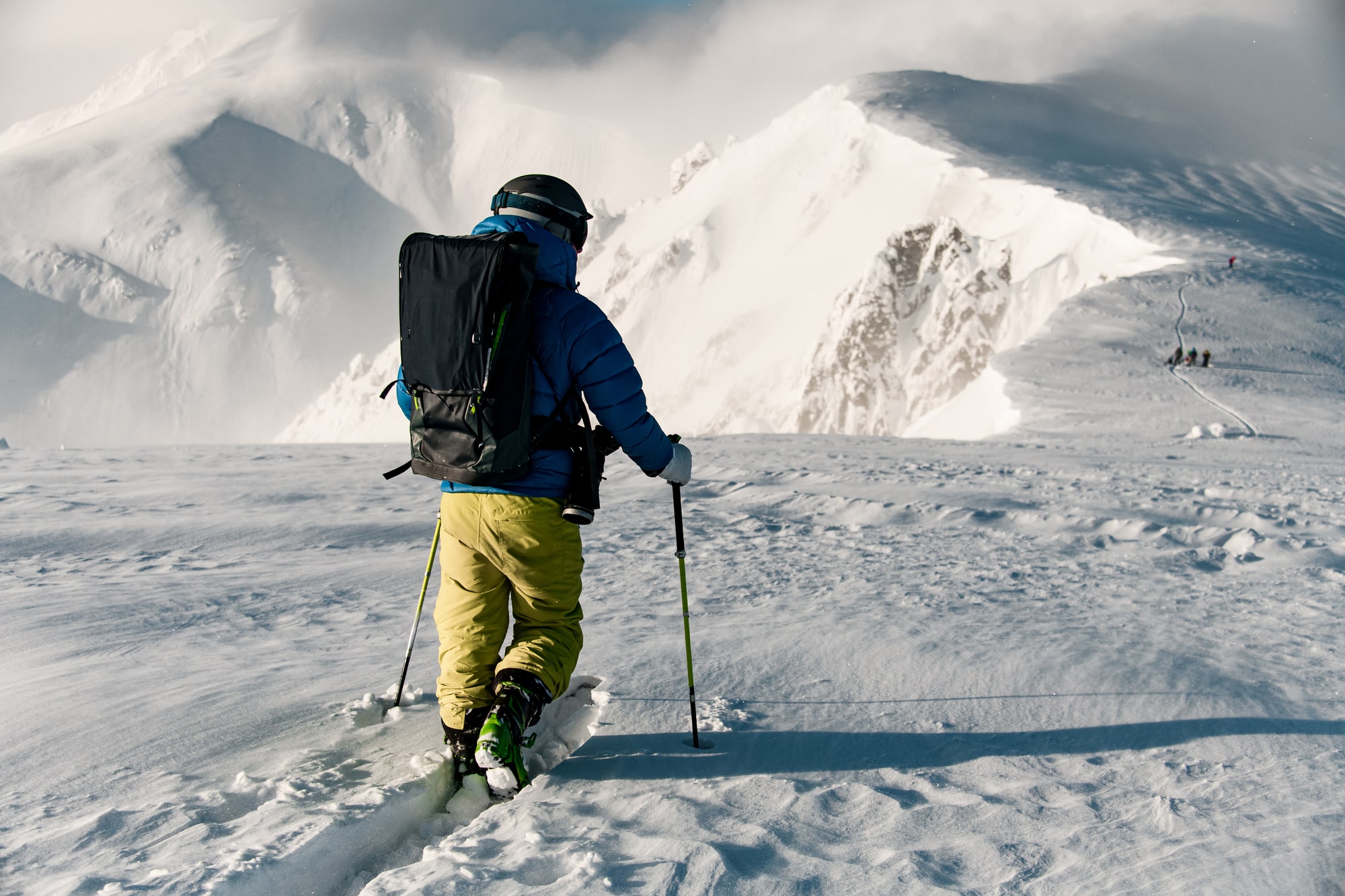 Skier on powdery snow.