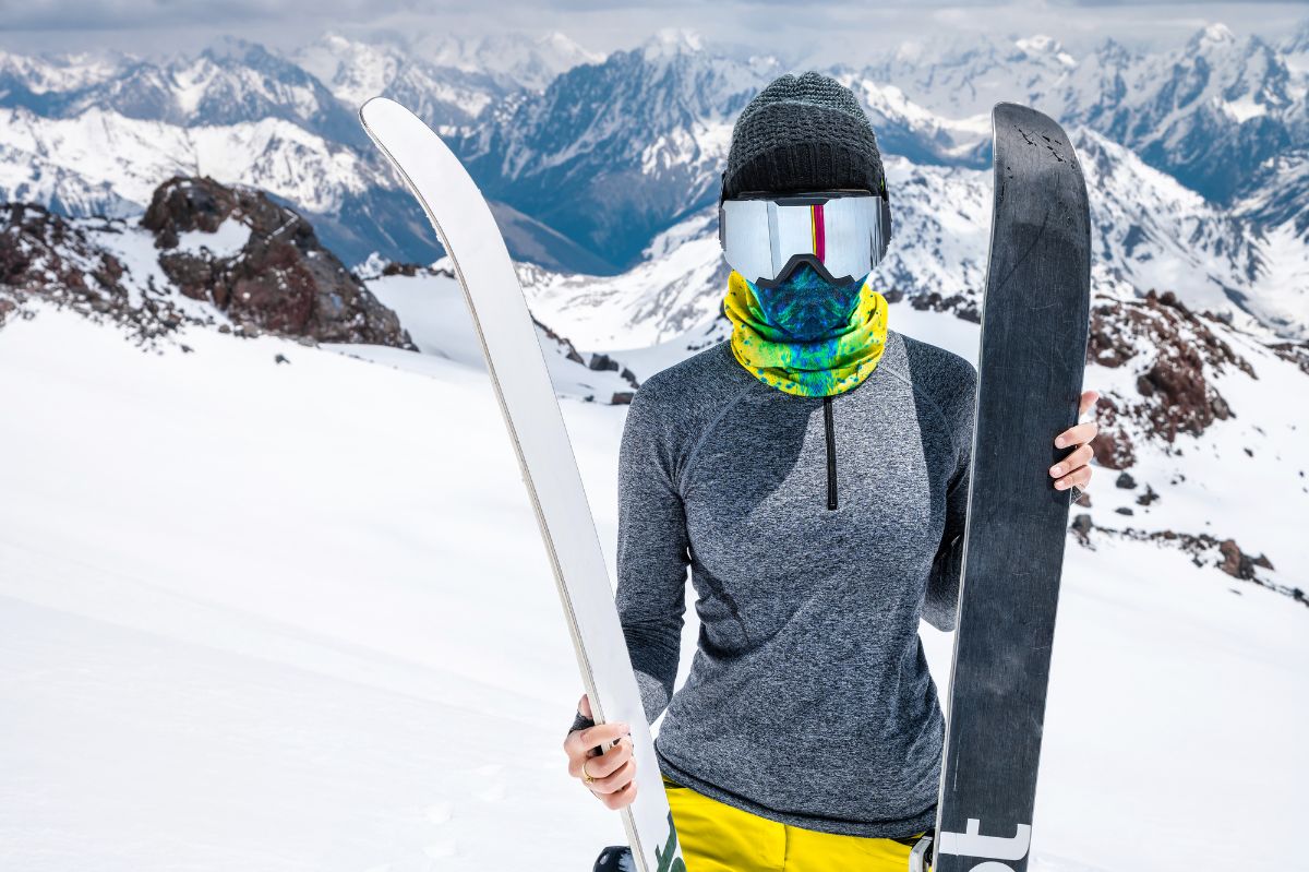 Woman skier wearing balaclava mask.